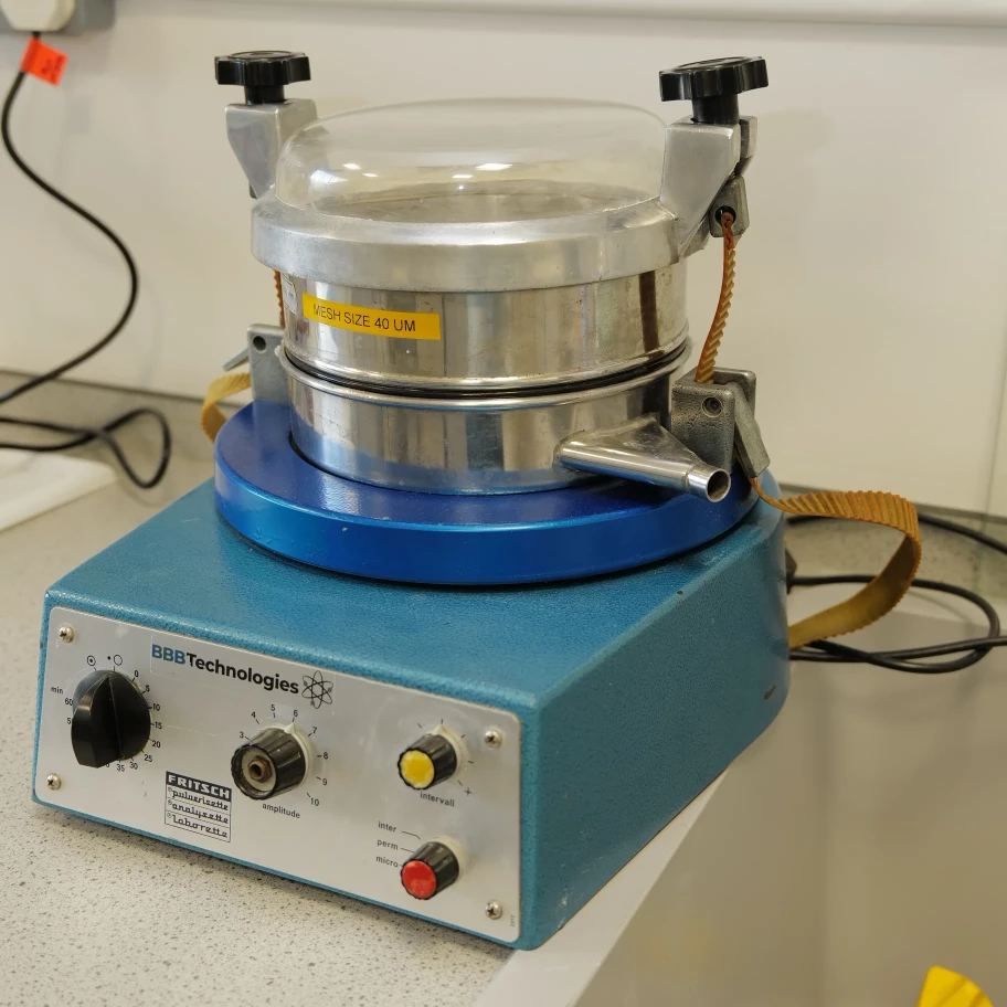 Equipment used to measure the particle size distribution of a powder.